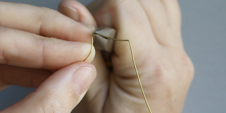 Fisch aus Draht und Nagellack