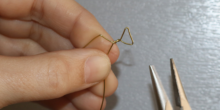 Fisch aus Draht und Nagellack