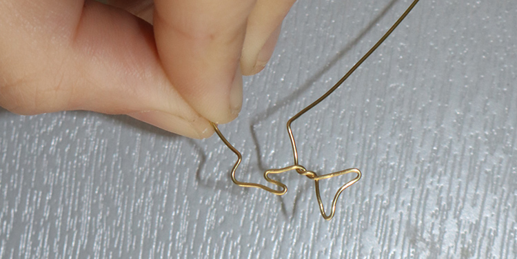 Fisch aus Draht und Nagellack