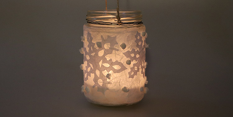 Schneegestöber Windlicht Scherenschnitt