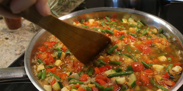 Paella umrühren